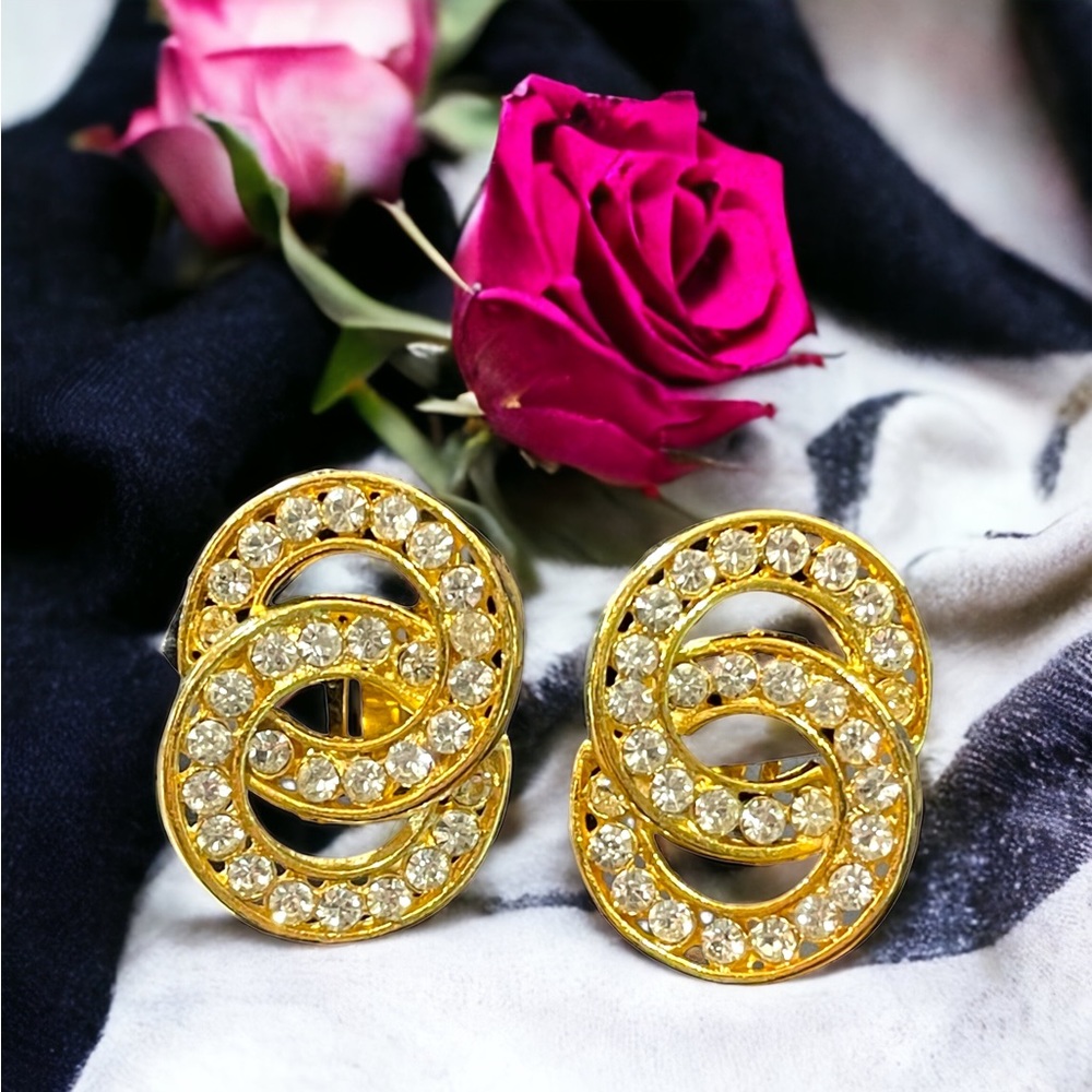 Lovely vintage 1980s NORMA JEAN gold finish rhinestone infinity circle clip ons